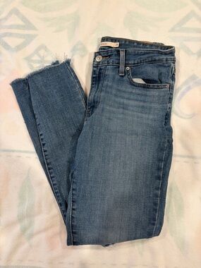 7 For All Mankind Medium Blue Skinny Jeans with Frayed Hem